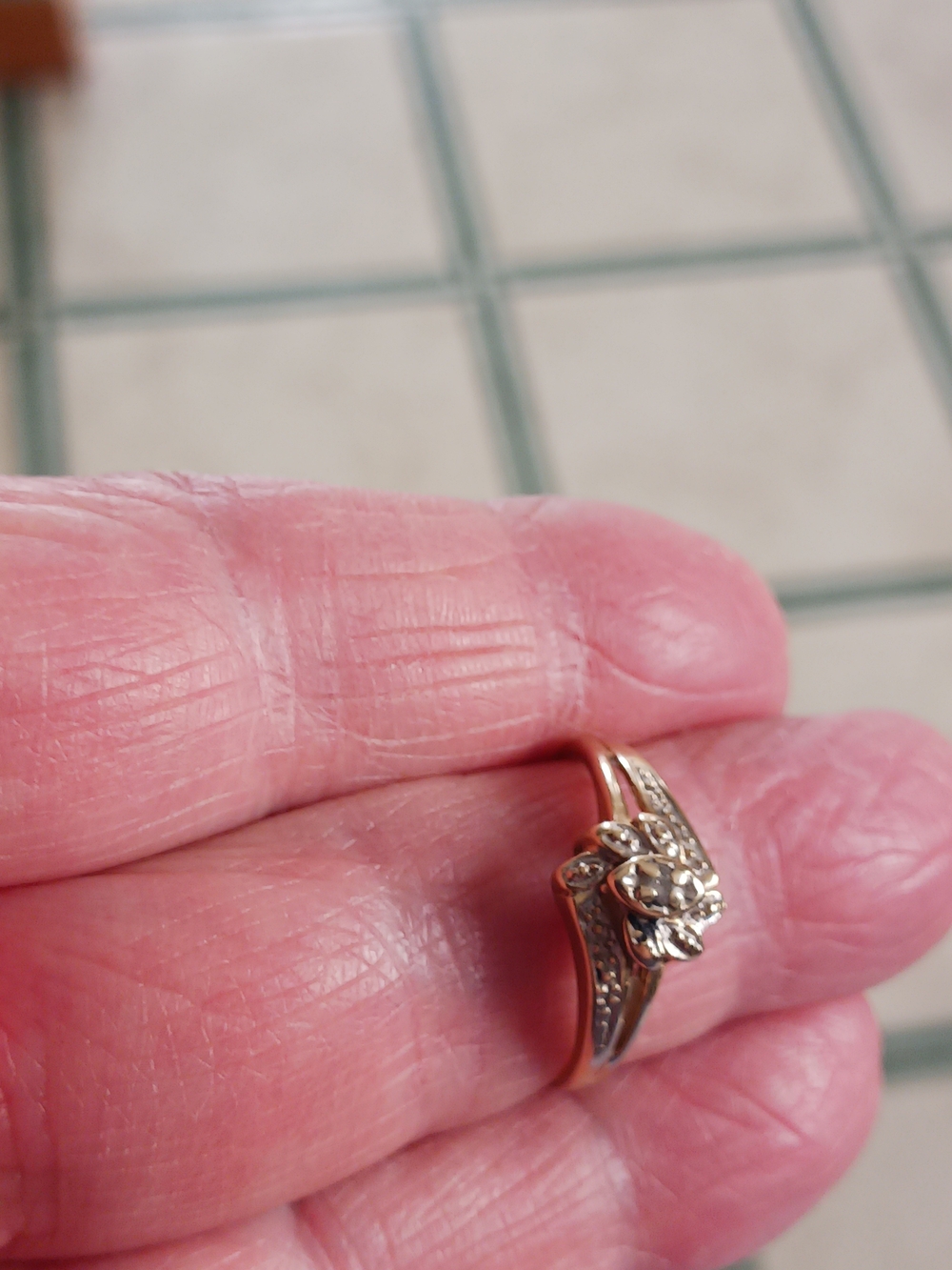 Elegant 10k Gold  Cluster Diamond Ring. This Ring Does Have One Missing Stone.